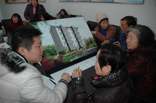 进社区 听民意 2014年老住宅小区综合改造方案意见征求会召开